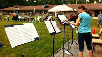 Playing violin outside